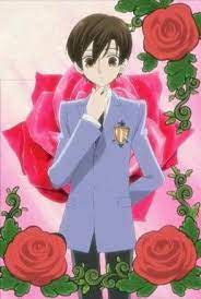Fujioka Haruhi standing with her hand on her chin with roses in the background