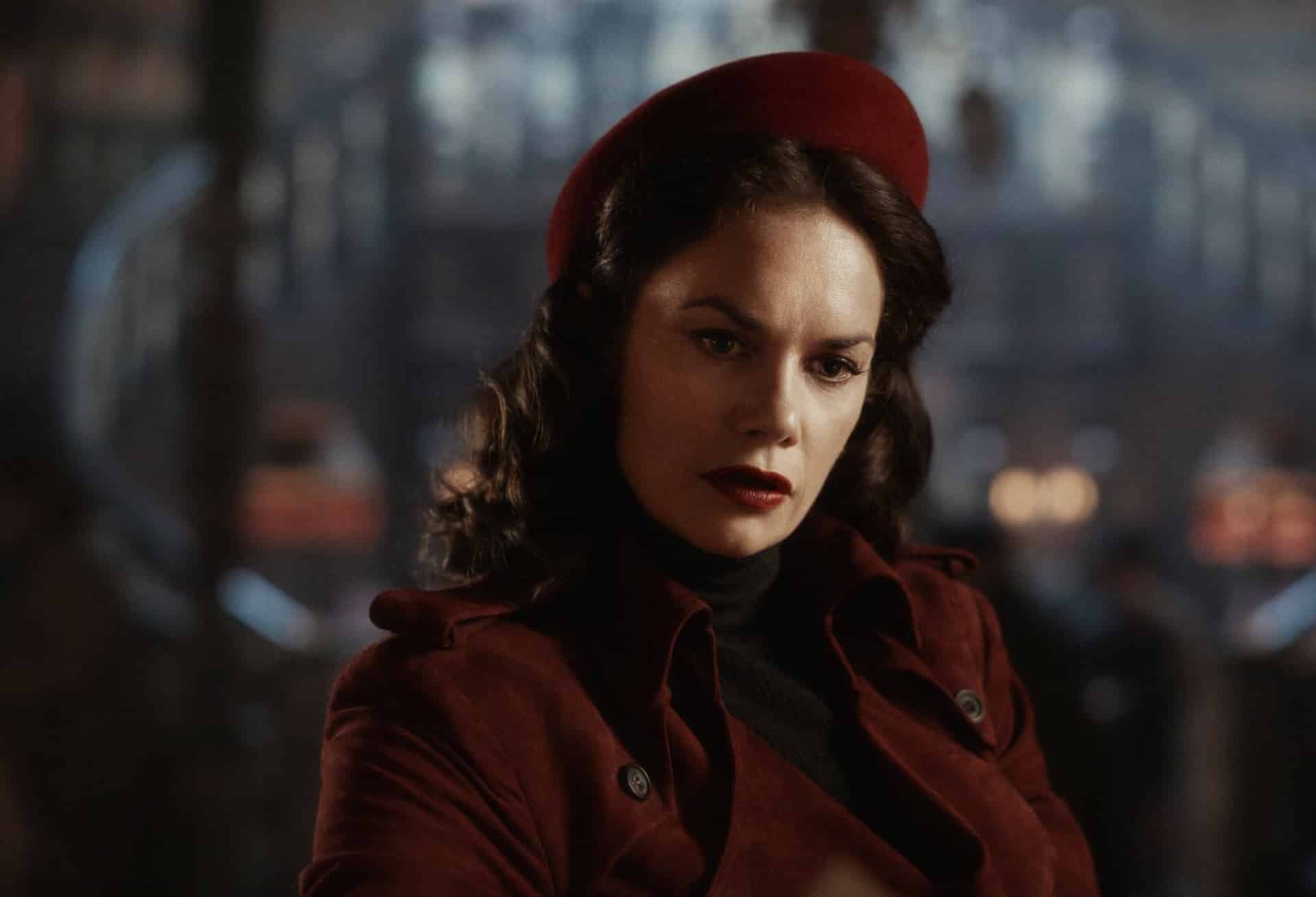his-dark-materials-mrs-coulter-character-wearing-red-beret-and-red-suit