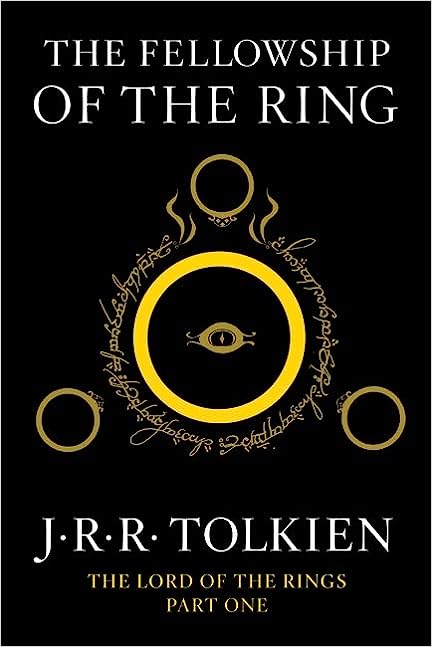 the lord of the rings fellowship of the ring book cover black background with golden rings in center one large and three smaller encircling it