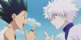 Gon Freecss and Killua Zoldyck facing each other and sticking out ther thumb and index finger.