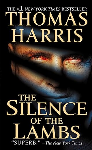 the-silence-of-the-lambs-book-cover-thomas-harris-shadowy-man-smiling-behind-title