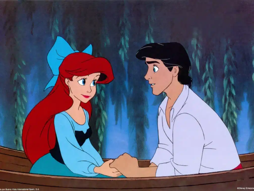 ariel-and-eric-in-a-canoe-on-a-little-creek-during-"kiss-the-girl"