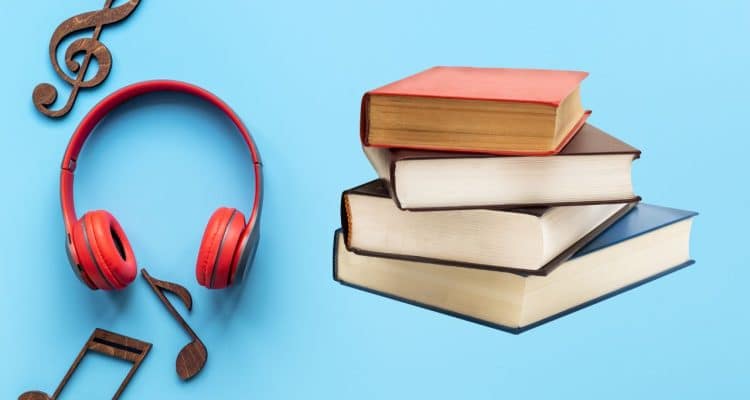 headphones and book stack on a blue background