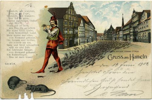 Old print of the pied piper leading the rats out of hamelin.