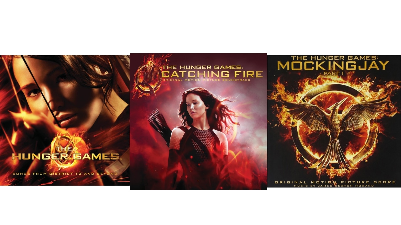 All three of the soundtrack album covers for the Hunger Games Trilogy. Left to right: Katniss aiming her bow, Katniss standing among fire, The Mockingjay symbol.
