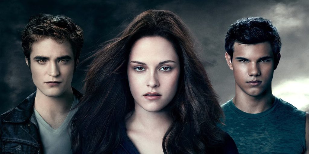 Robert Pattinson, Kristen Stewart, and Taylor Lautner in front of a cloudy background
