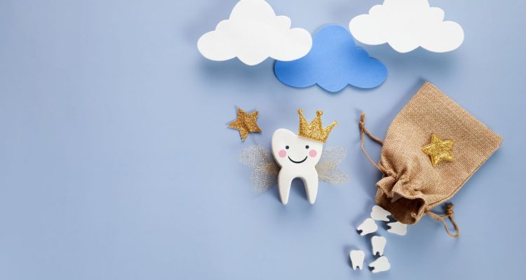 Tooth with crown and wings floating with clouds