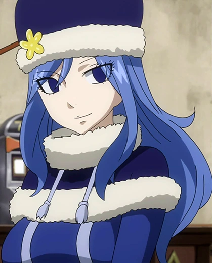 Woman with blue hair and eyes wearing snow coat and hat smiling image