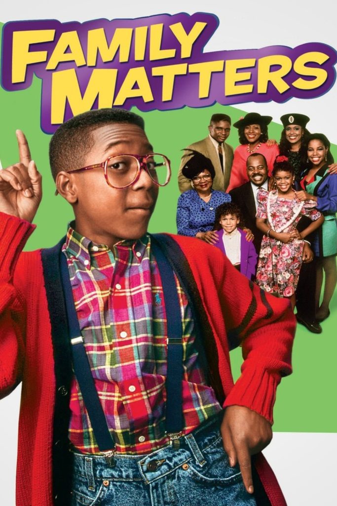 Family Matters smiling behind the character Steve Urkel, who is pointing at the title.