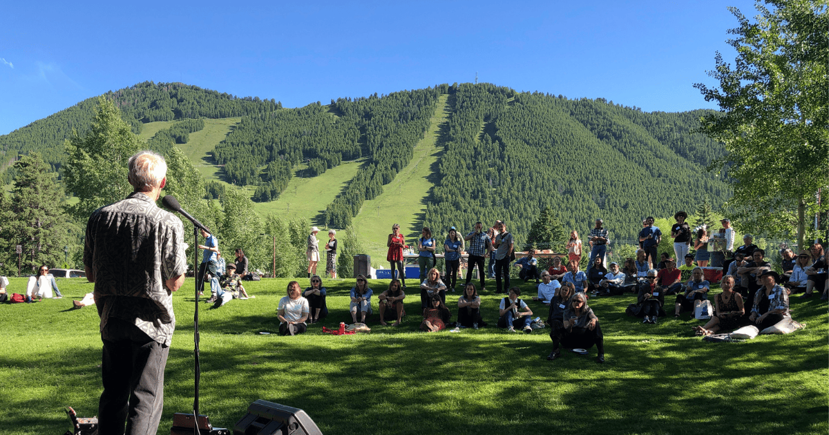 Students of the Jackson Hole Writers Conference attend an outdoor reading