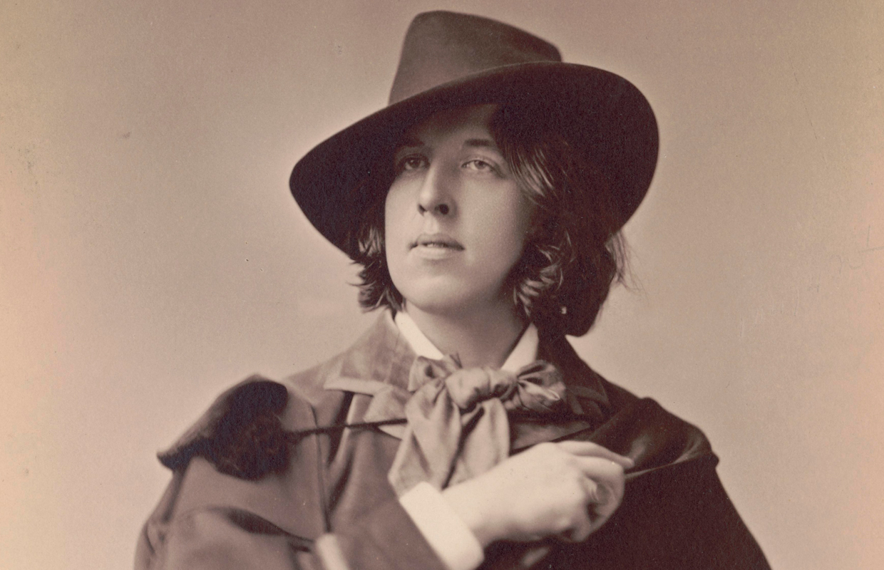 Closeup of Oscar Wilde wearing a hat