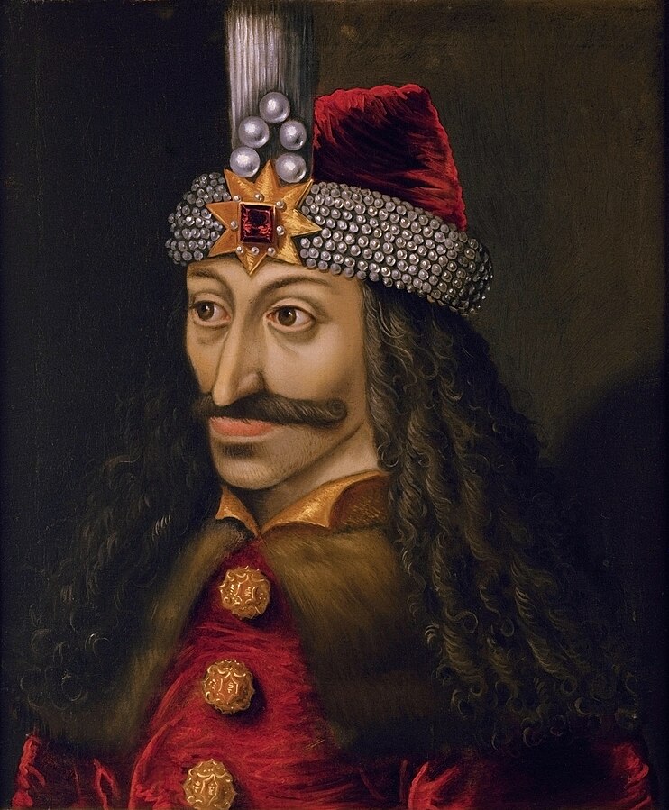 15th century portrait of Vlad Dracula in a hat and cloak