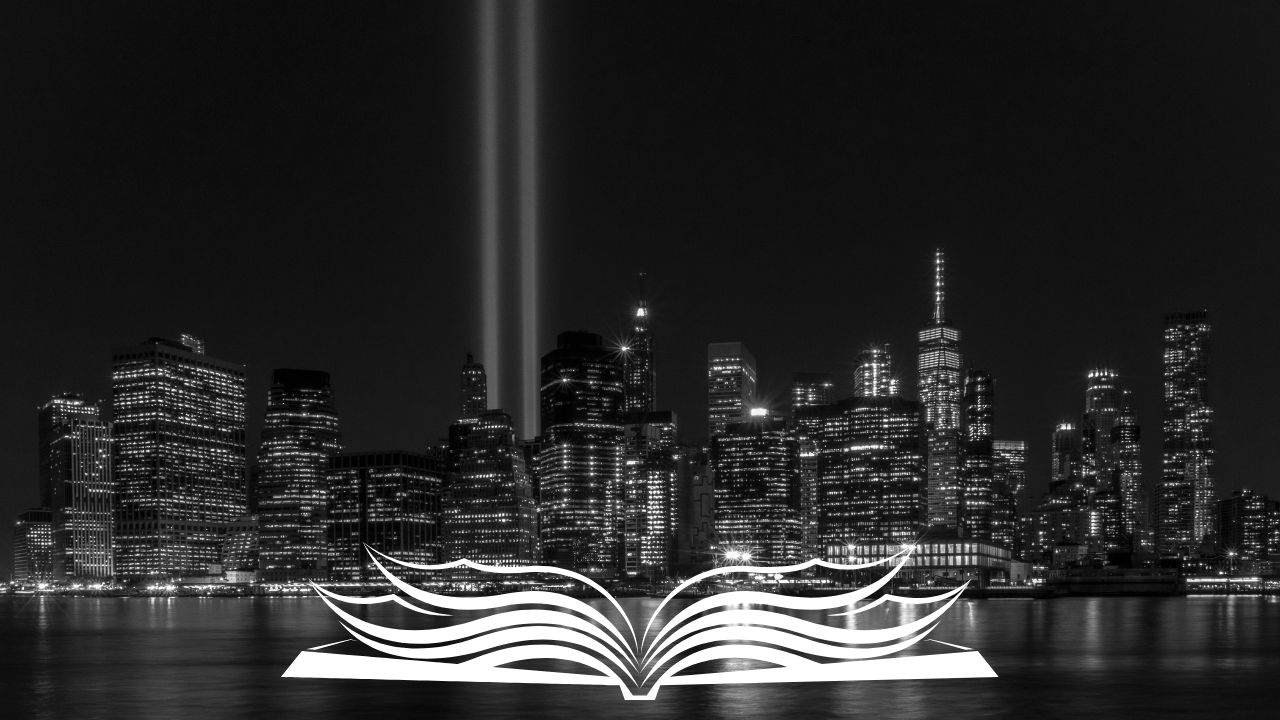light view of the 9/11 tower memorial with a white open book at the botton