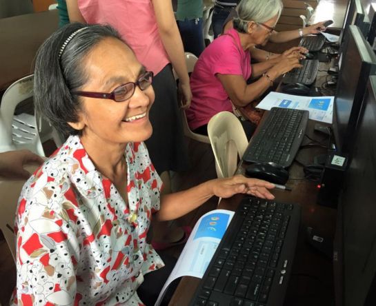 The Beyond Access Initiative Lady using the computer for the global program 