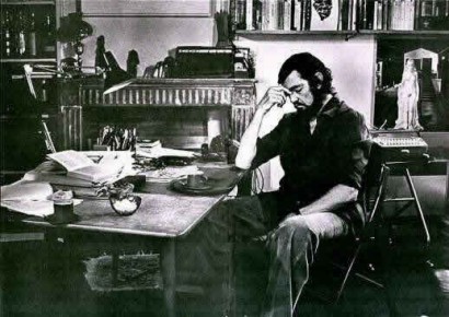 El Grito Literario Julio Cortazar in his working desk writing a new novel while experiencing his creative process