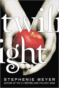Twilight by Stephanie Meyer cover; pale white hands holding apple