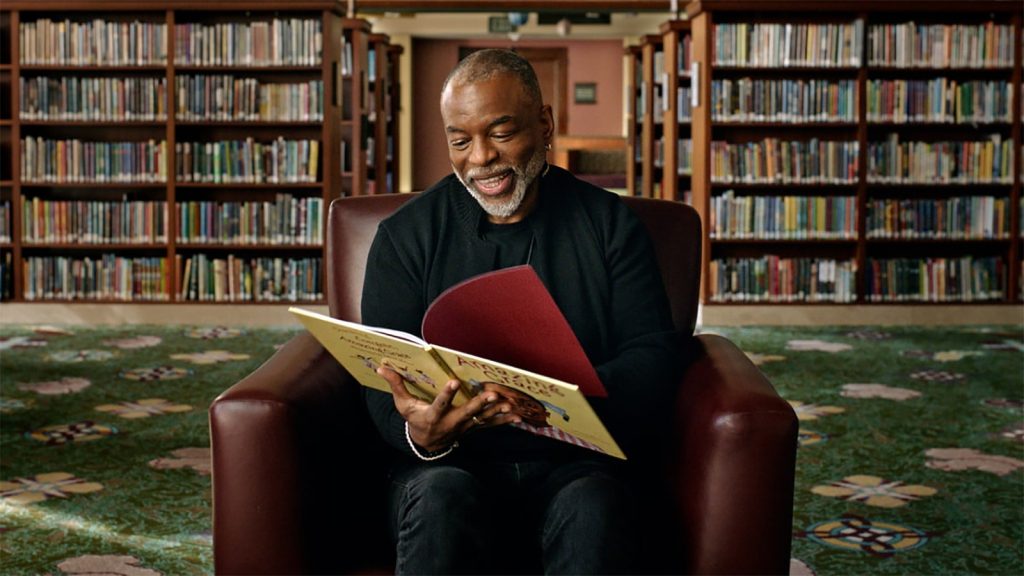 LeVar Burton reading Amazing Grace book in library