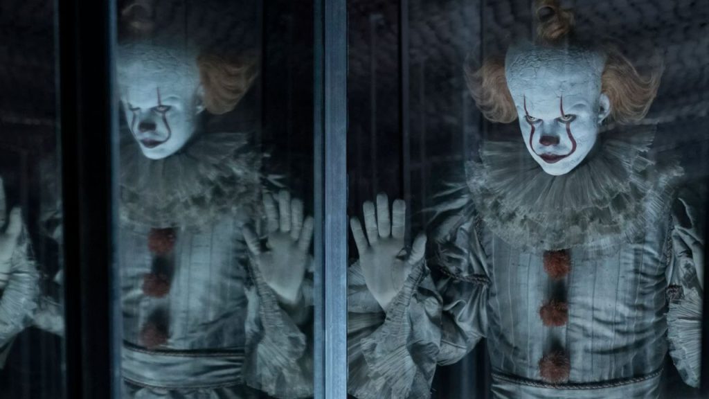 Bill Scarsgard as Pennywise in reflection scene