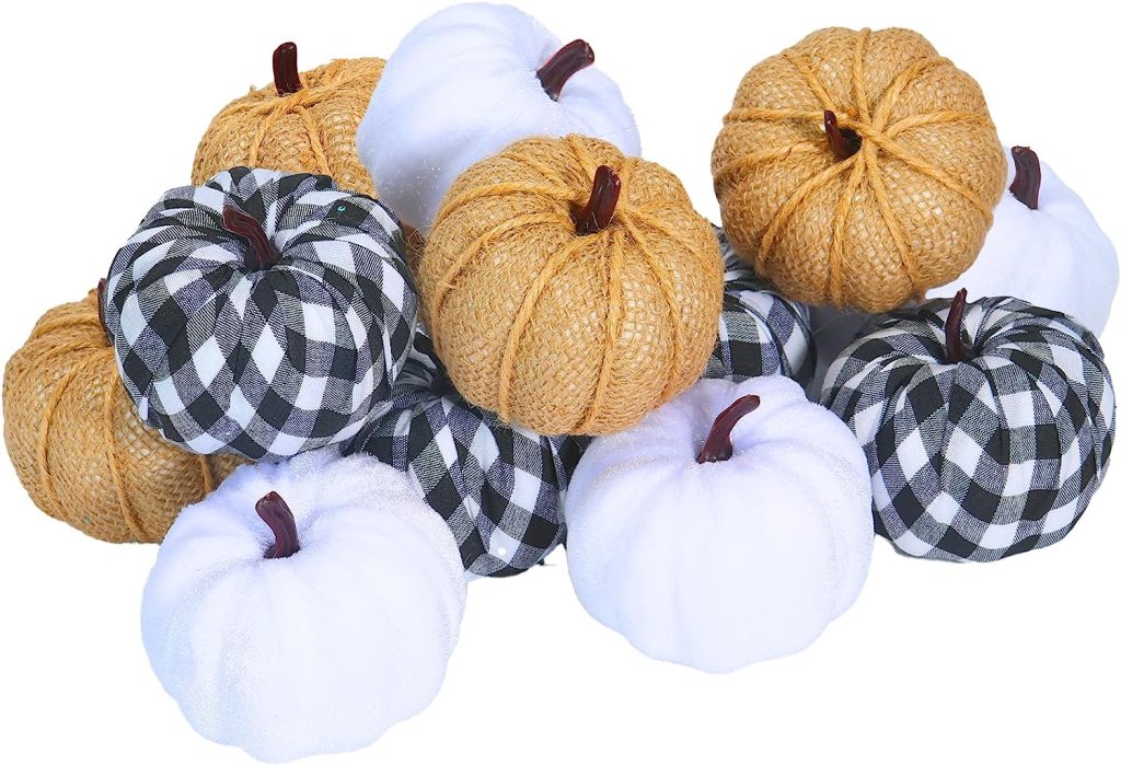 Small decorative pumpkins. A mix of white, brown, and black and white checkered.