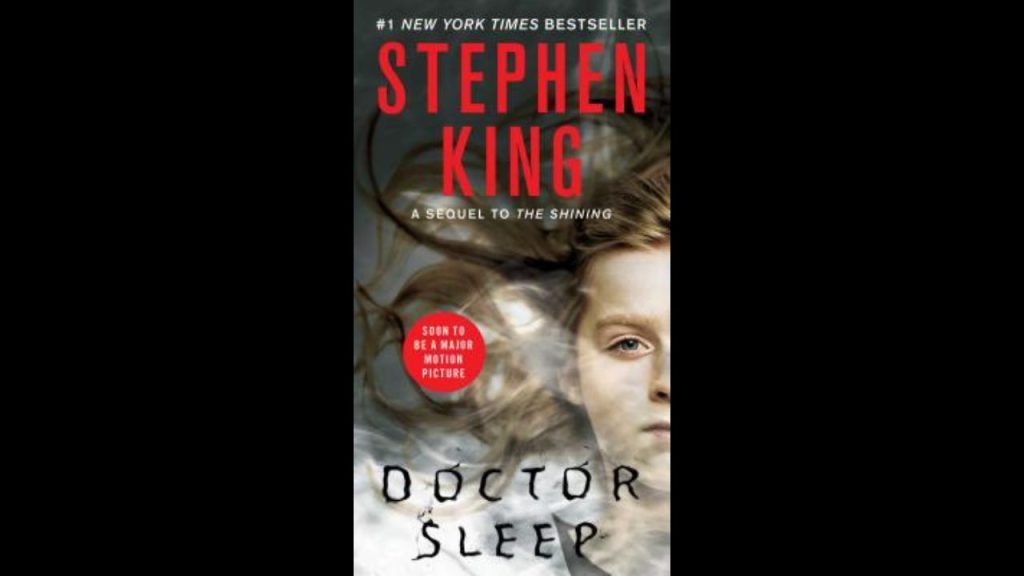 Doctor Sleep cover by Stephen King, young girl looking straight ahead with her hair strewn around her head. 