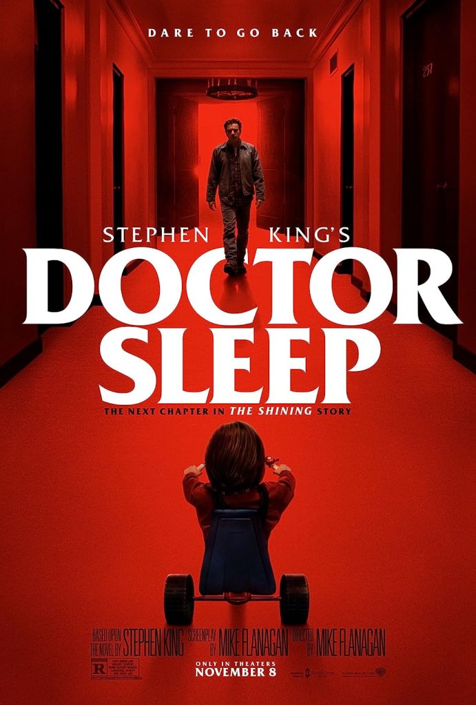 Doctor sleep movie poster, child riding a tricyle down a red hallway toward a man.