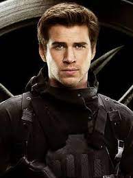 Gale Hawthorne from 'Mockingjay' staring at the camera wearing all black