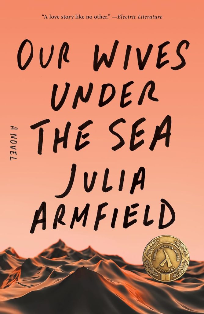 Our Wives Under the Sea cover by Julia Armfield, sand dunes in front of an orange sky. 