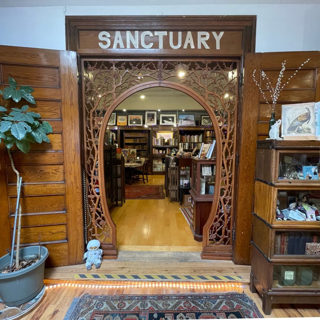 Gorgeous wood entrance into the "sanctuary" at Loganberry Books.