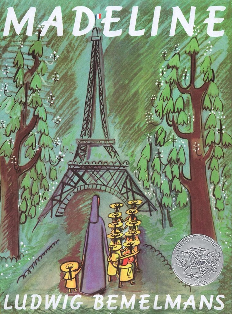 Madeline cover with a group of girls in yellow walking toward the Eiffel Tower.
