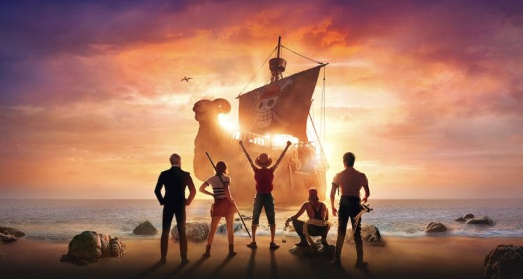 A promotional photo from Netflix's One Piece Live-Action series featuring five character silhouettes staring at a ship with a sunset in the background.