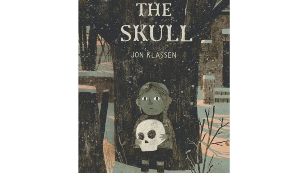 The Skull cover by Jon Klassen, showing a little girl in a snowy forest holding a skull.