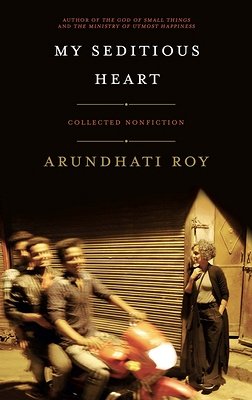'My Seditious Heart: Collected Nonfiction' by Arundhati Roy book cover showing the author and three blurry men on a motorcycle