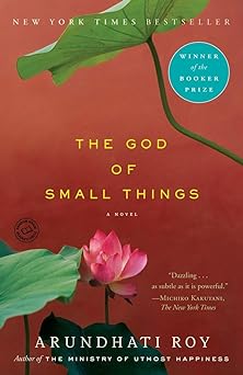 'The God of Small Things' by Arundhati Roy book cover with a brown background, a pink flower, and some leaves