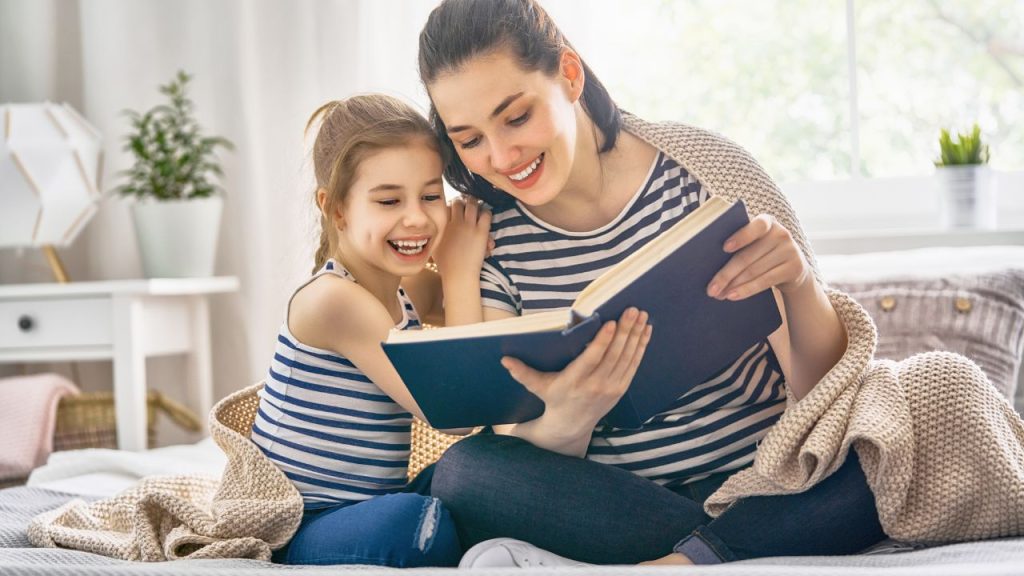 Mother and Daughter reading a book 