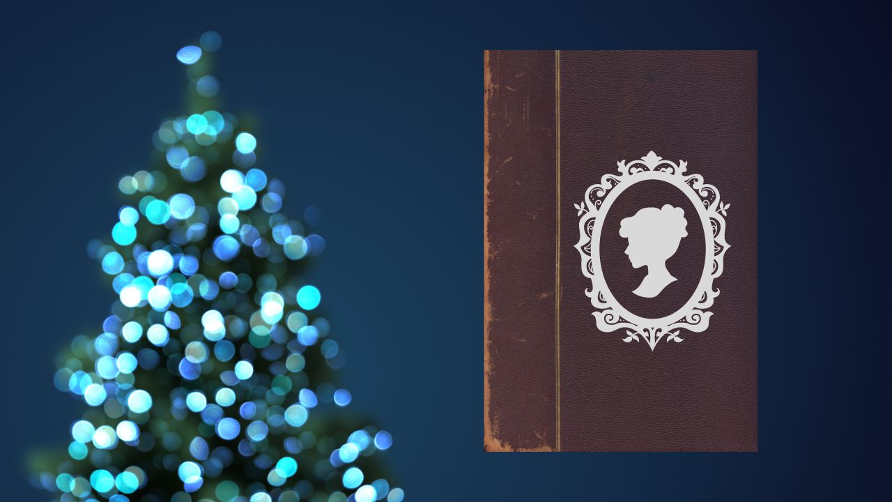 Blurred lit blue christmas tree with a leather bound book and cameo