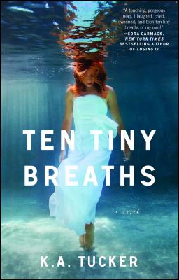 'Ten Tiny Breaths' by K. A. Tucker book cover showing a woman standing underwater