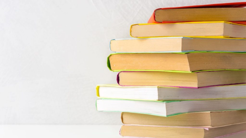 pile of rainbow books