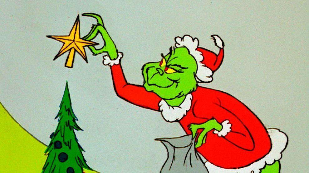 'How the Grinch Stole Christmas!' TV special Grinch stealing the star from a Christmas tree.