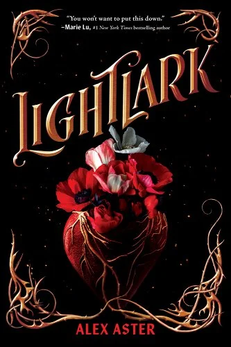 "Lightlark" in gold text against a black background. Gold spirals are in each corner with a heart-shaped rose in the center of the cover.
