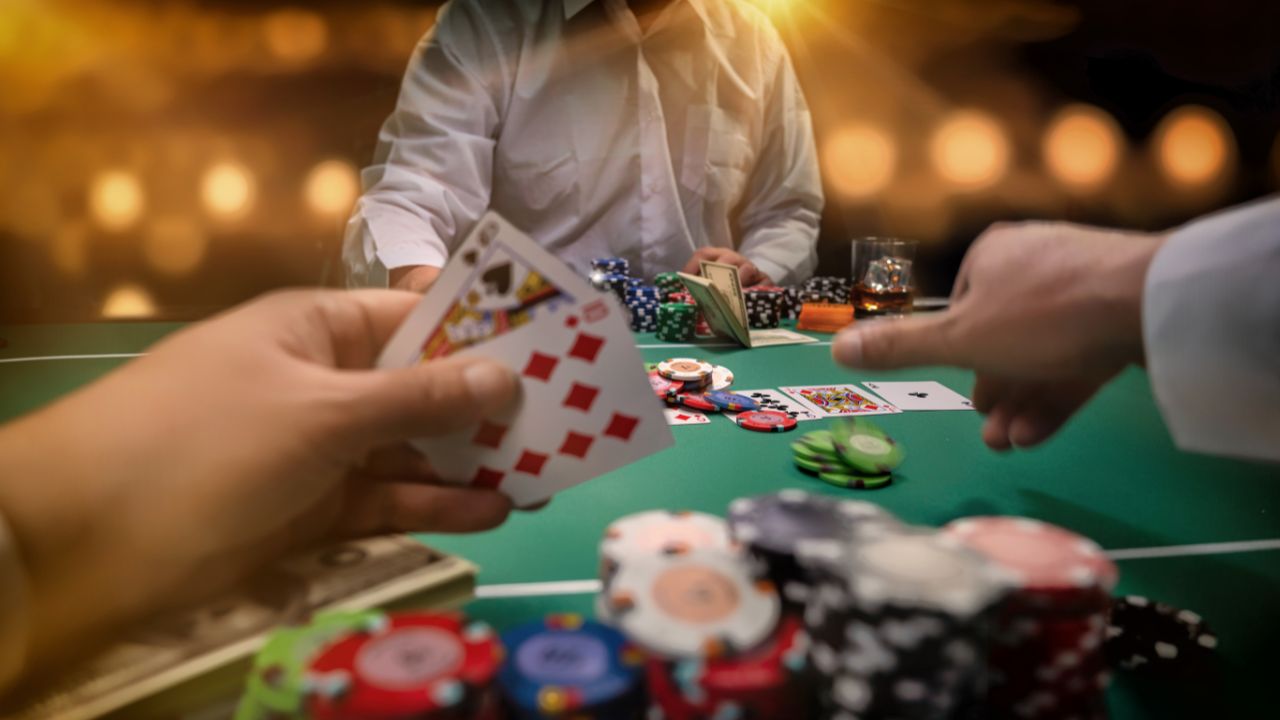 gambling table with chips and cards in play