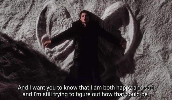 movie still of Charlie making a snow angel with text of quote