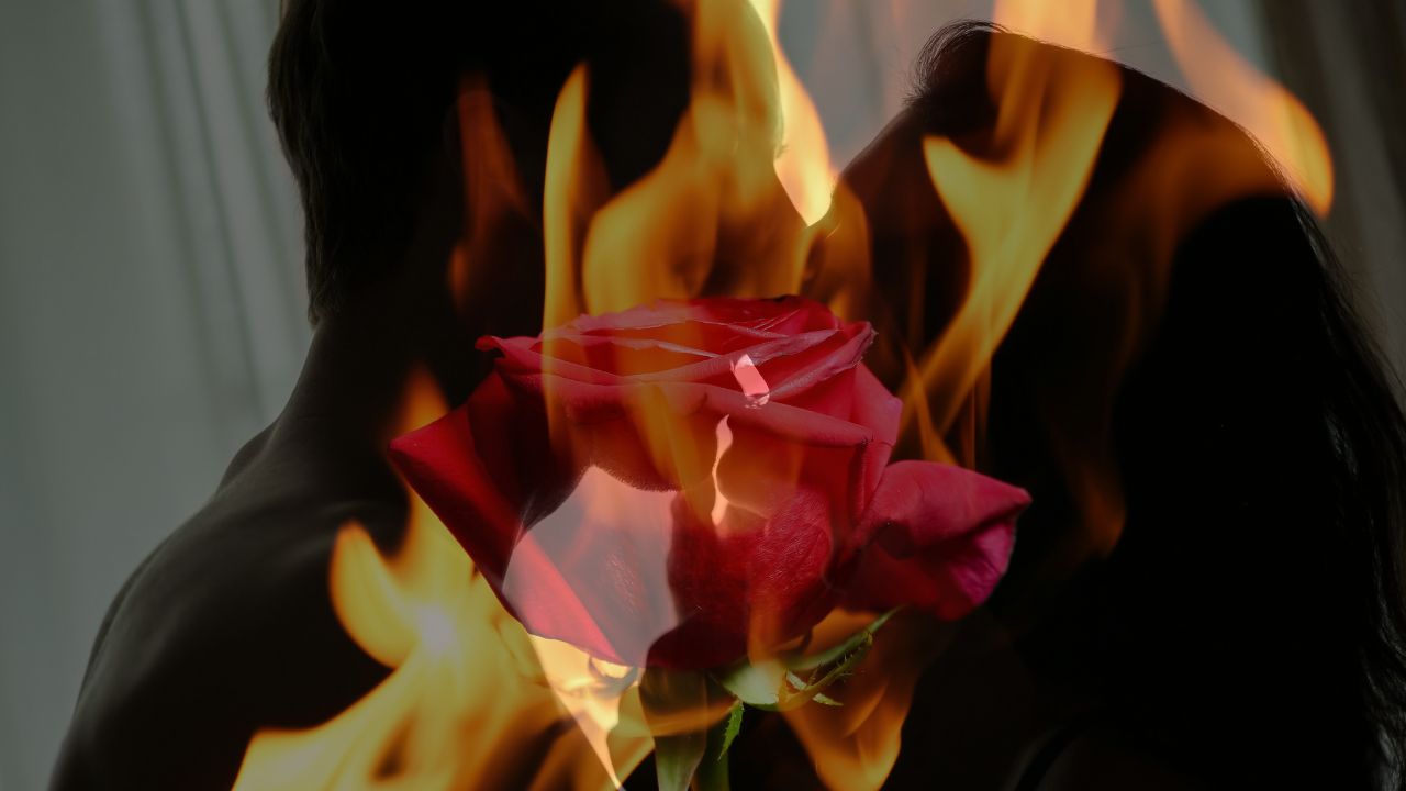 flames superimposed over a romantic couple