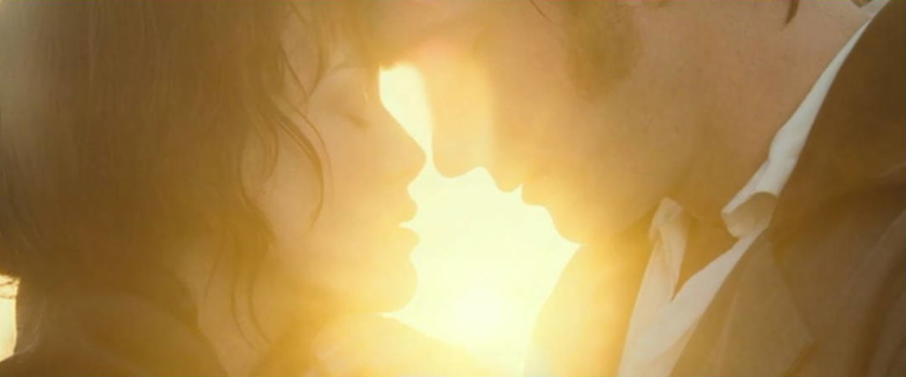 Elizabeth and Darcy touching foreheads and nearly kissing
