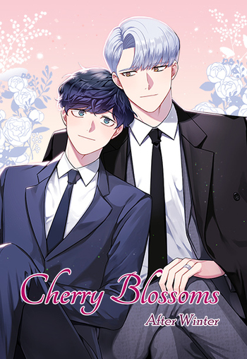 Man with silver hair in black suit leaning onto man with blue hair in blue suit while they smile at each other