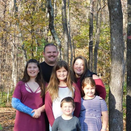 Kristi and her family at the park during fall, 2019.
