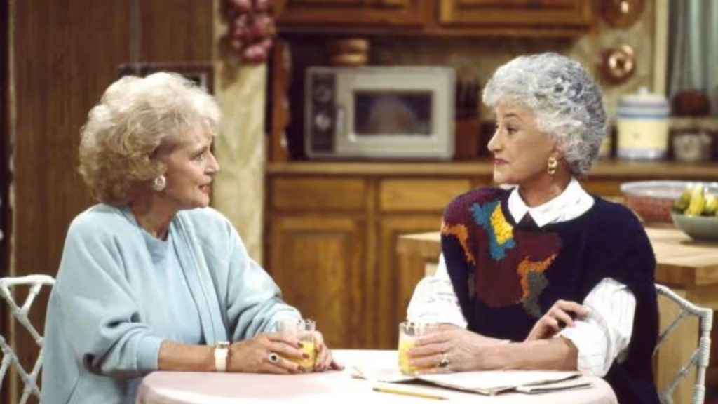 A still from an episode of "The Golden Girls" featuring Bea Arthur and Betty White.