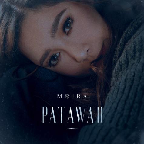 Cover of Moira Dela Torre's abum, showing a person with their head in their lap looking at the camera. 