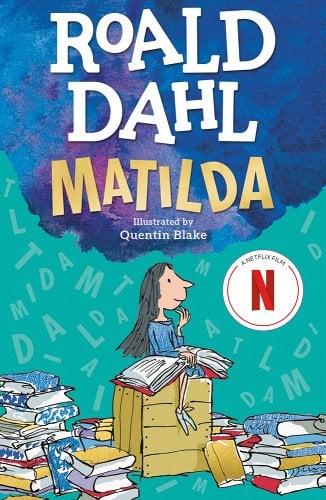 Matilda by Ronald Dahl book cover. A cartoon of a young girl thinking, book open on her lap and closed books surrounding her.