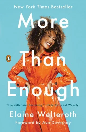 An image of Elaine Welteroth smiling in an orange raincoat dress on a lightblue background.