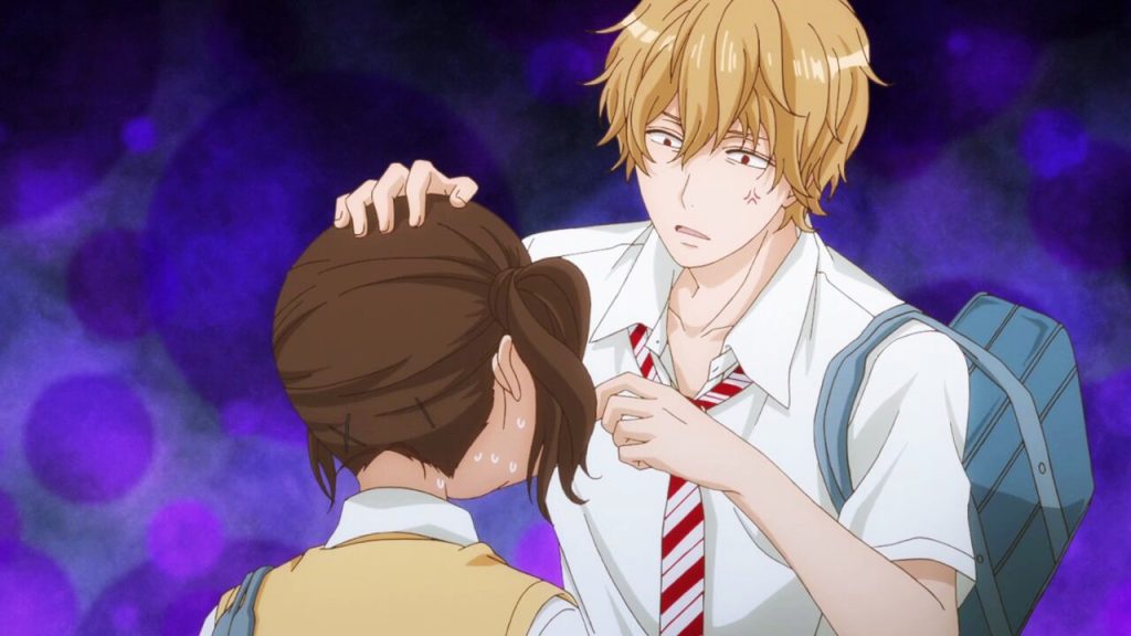 Kyōya Sata pulling on Erika Shinohara's cheek.